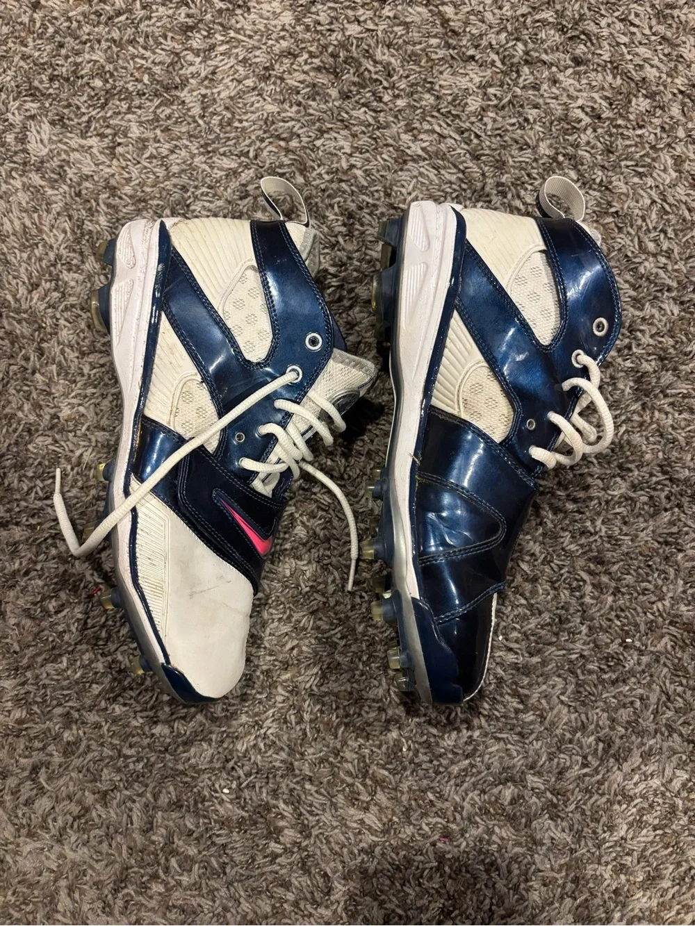 Nike Navy and White Cleats with Pink Accent